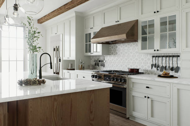 istockphoto-1755563909-612x612 Traditional large L-shaped kitchen with large island and kitchen appliances. Kitchen interior with white cabinets and wooden island. 3D rendering