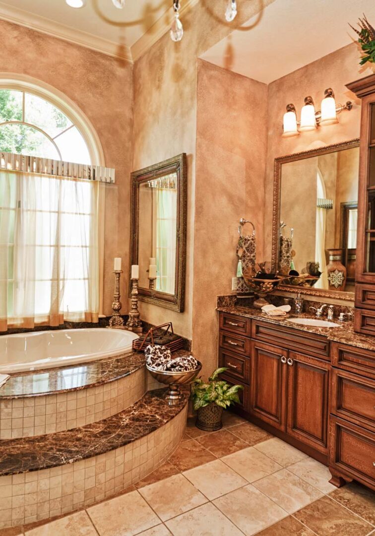 A large bathroom with a tub and sink.
